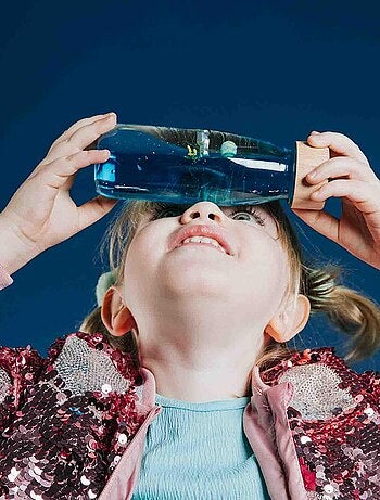 Giocattolo per neonato bottiglia sensoriale con suono | Petit Boum