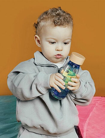Giocattolo per neonato bottiglia sensoriale con suono | Petit Boum