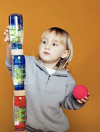 Giocattolo per neonato bottiglia sensoriale con suono | Petit Boum