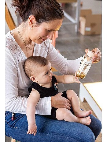 Giocattolo per neonato bottiglia sensoriale con suono | Petit Boum