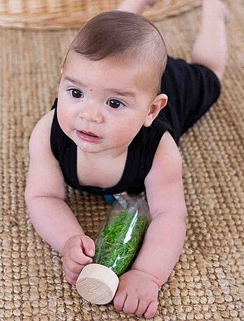 Giocattolo per neonato bottiglia sensoriale con suono | Petit Boum