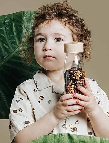 Giocattolo per neonato bottiglia sensoriale con suono | Petit Boum