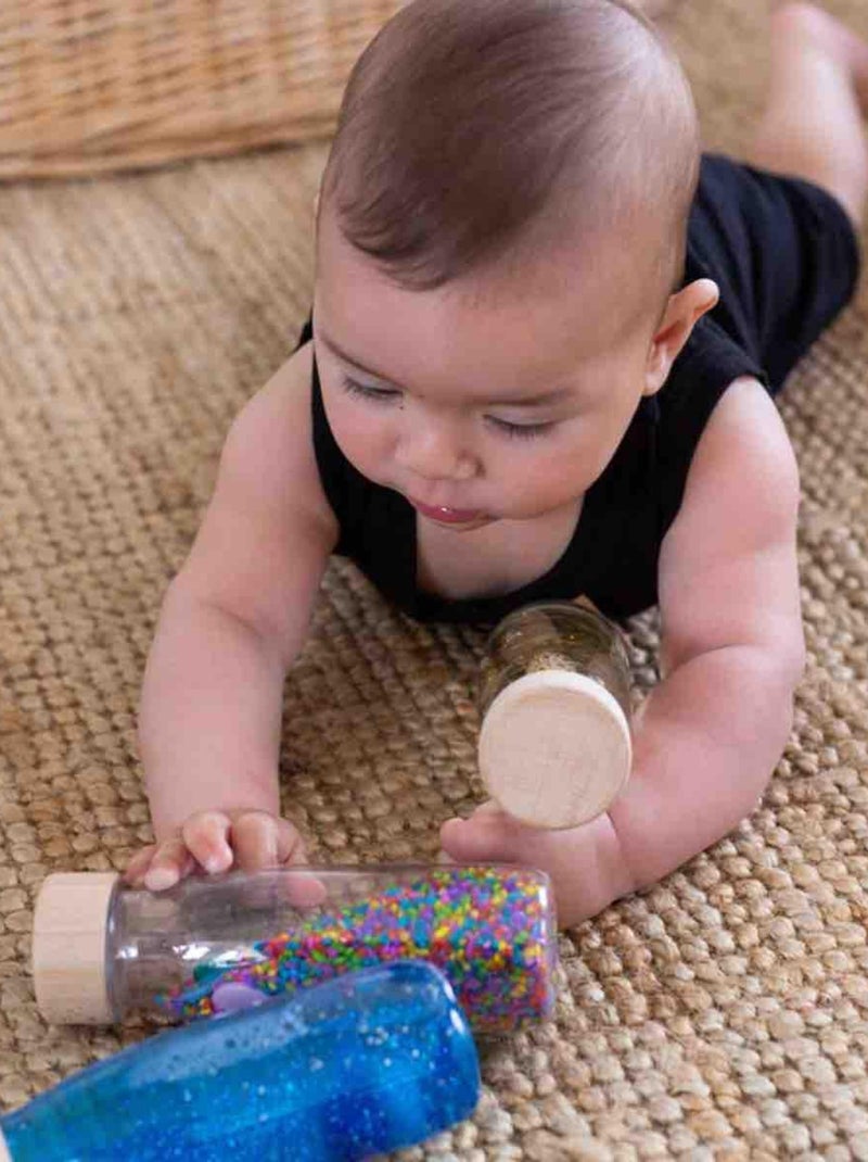 Giocattolo per neonato bottiglia sensoriale con suono | Petit Boum Verde - Kiabi