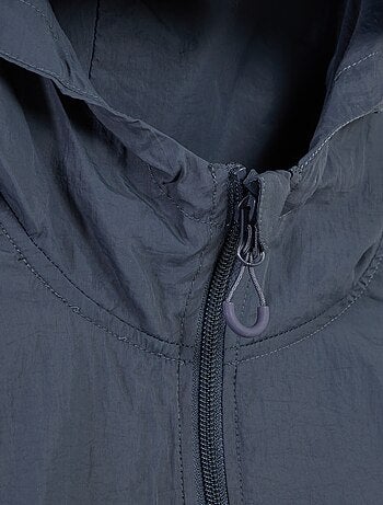 Giubbotto antipioggia con cappuccio - collezione facile da indossare