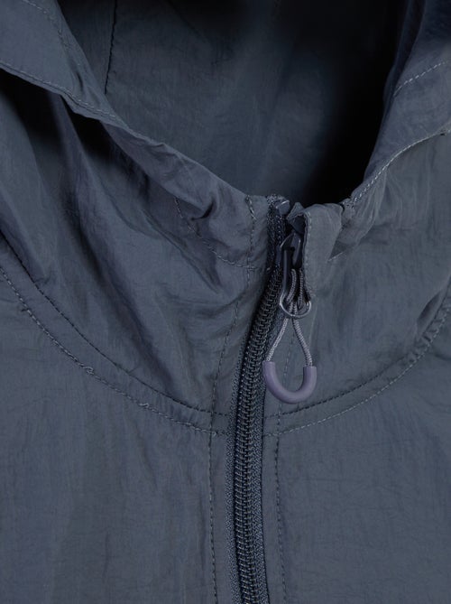 Giubbotto antipioggia con cappuccio - collezione facile da indossare - Kiabi