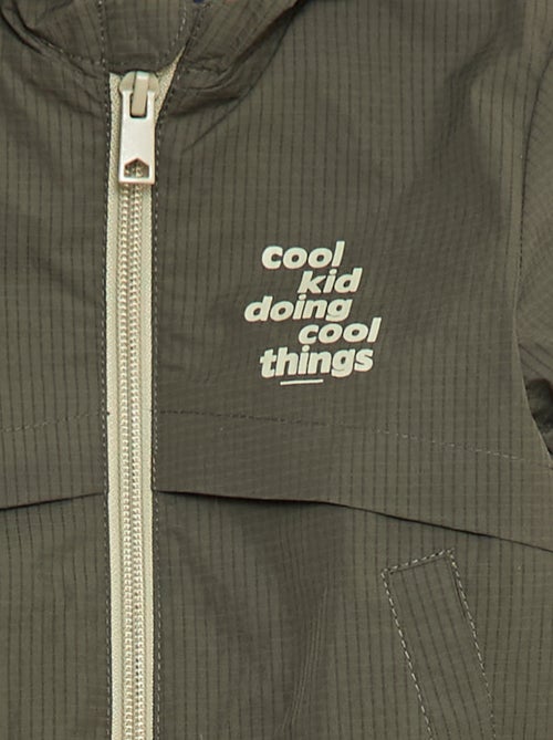 Giubbotto antivento impermeabile con cappuccio - Kiabi