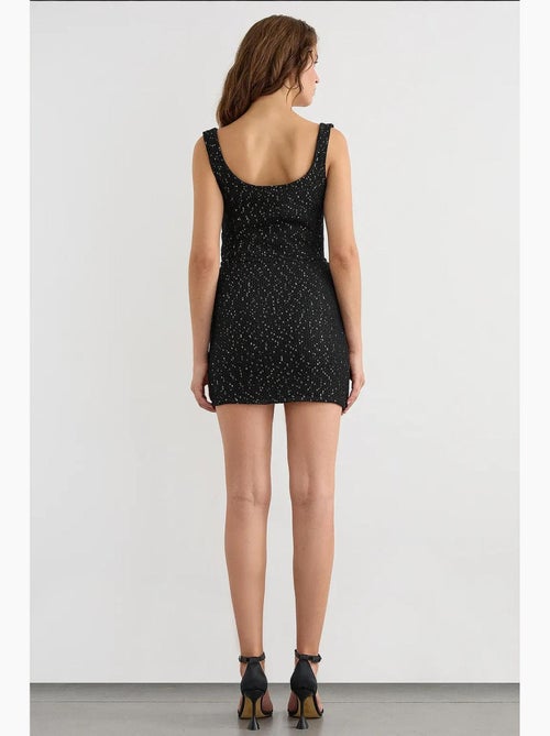 Gonna avvolgente in maglia con paillettes, orlo senza cuciture e cintura hiccup - Kiabi Gonna avvolgente in maglia con paillettes, orlo senza cuciture e cintura hiccup - Kiabi