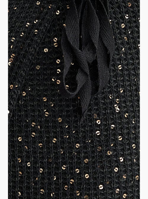 Gonna avvolgente in maglia con paillettes, orlo senza cuciture e cintura hiccup - Kiabi Gonna avvolgente in maglia con paillettes, orlo senza cuciture e cintura hiccup - Kiabi