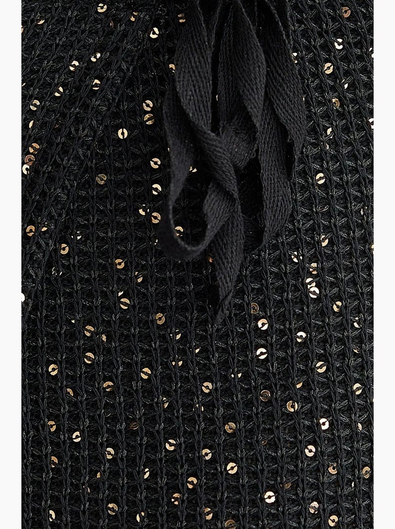 Gonna avvolgente in maglia con paillettes, orlo senza cuciture e cintura hiccup Nero - Kiabi