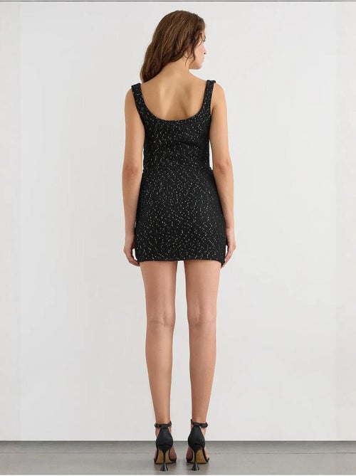 Gonna avvolgente in maglia con paillettes, orlo senza cuciture e cintura - Kiabi Gonna avvolgente in maglia con paillettes, orlo senza cuciture e cintura - Kiabi