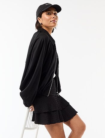 Gonna corta a balze in maglia crinckle