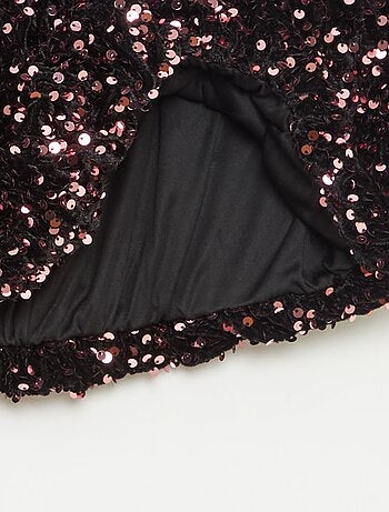 Gonna corta a paillettes tinta unita