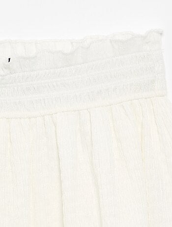Gonna corta a ruota con shorts integrati