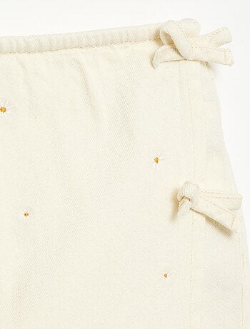 Gonna-pantaloncino con motivi ricamati all over