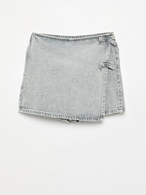 Gonna pantaloncino corto in denim con nodi - Kiabi Gonna pantaloncino corto in denim con nodi - Kiabi