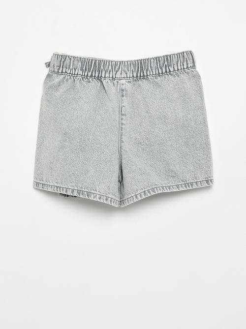 Gonna pantaloncino corto in denim con nodi - Kiabi Gonna pantaloncino corto in denim con nodi - Kiabi