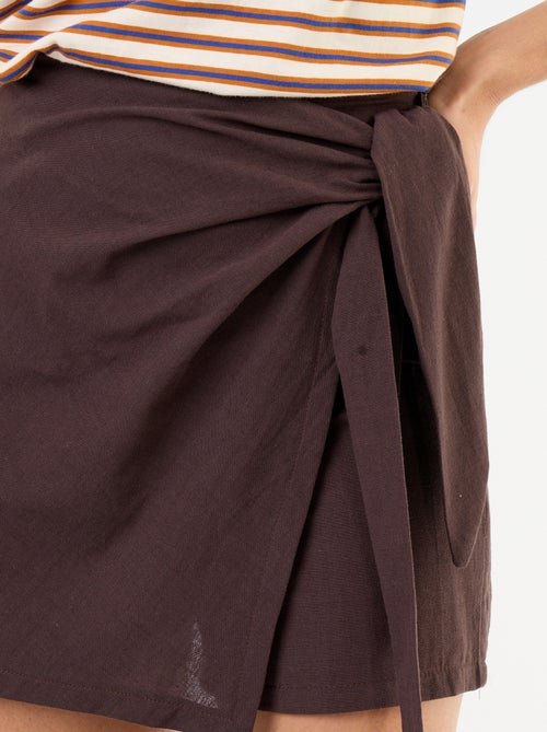 Gonna pantaloncino leggera con cintura da annodare - Kiabi Gonna pantaloncino leggera con cintura da annodare - Kiabi
