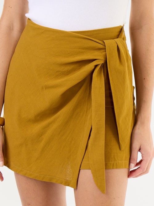 Gonna pantaloncino leggera con cintura da annodare - Kiabi Gonna pantaloncino leggera con cintura da annodare - Kiabi