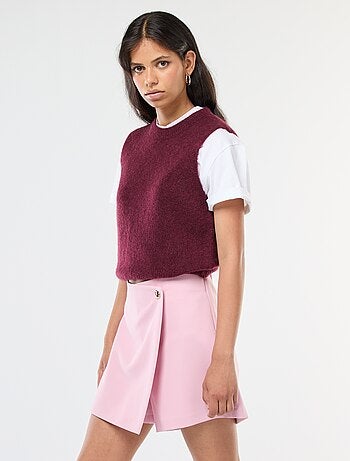 Gonna pantalone asimmetrica con bottone dorato