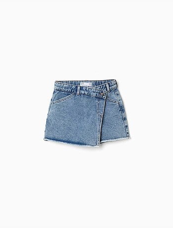 Gonnellina in denim con chiusura frontale asimmetrica