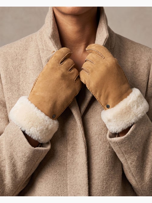 Guanti caldo e morbido, in pelle di pecora con interno in finta donna - Kiabi Guanti caldo e morbido, in pelle di pecora con interno in finta donna - Kiabi