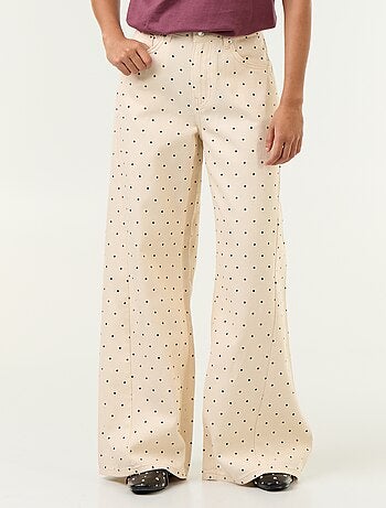 Jeans a gamba larga a pois