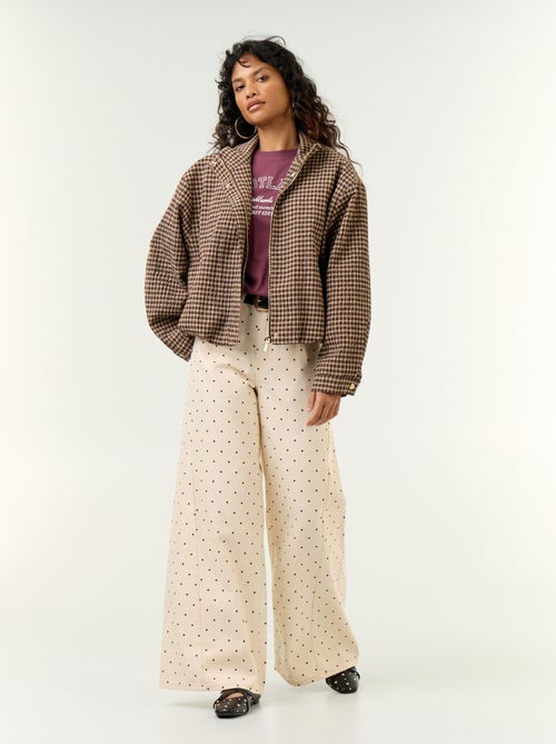 Jeans a gamba larga a pois - Kiabi Jeans a gamba larga a pois - Kiabi