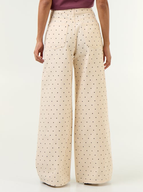 Jeans a gamba larga a pois - Kiabi Jeans a gamba larga a pois - Kiabi