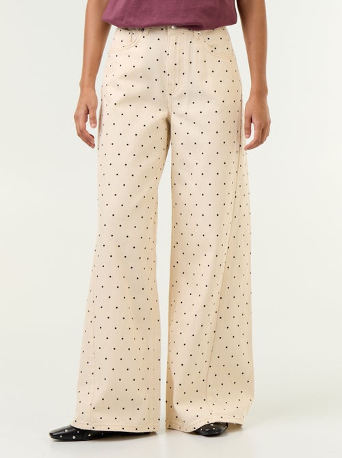 Jeans a gamba larga a pois - Kiabi Jeans a gamba larga a pois - Kiabi