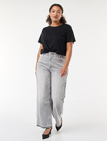 Jeans a gamba larga con orli grezzi