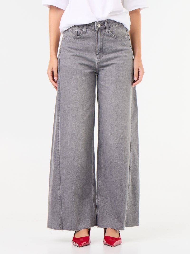 Jeans a gamba larga con orlo a taglio vivo Grigio - Kiabi