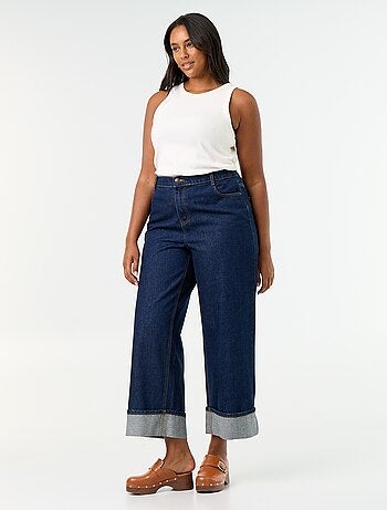 Jeans a gamba larga con risvolto alla base