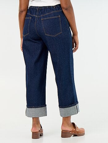 Jeans a gamba larga con risvolto alla base