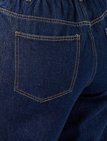Jeans a gamba larga con risvolto alla base