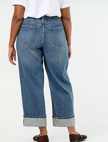 Jeans a gamba larga con risvolto alla base