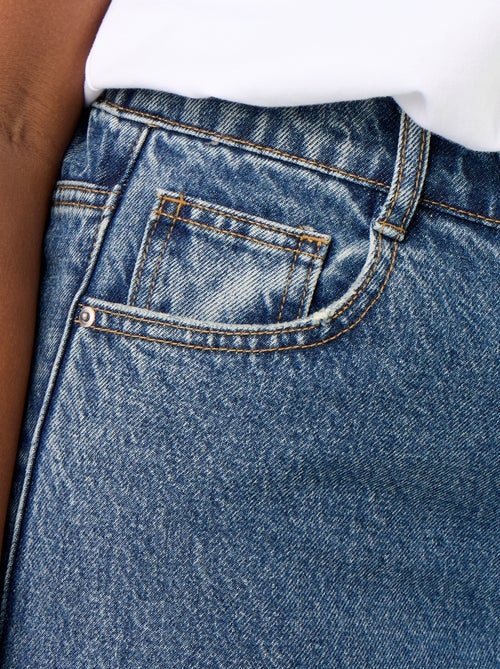 Jeans a gamba larga con risvolto alla base - Kiabi Jeans a gamba larga con risvolto alla base - Kiabi
