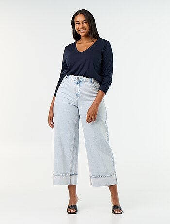 Jeans a gamba larga con risvolto alla base