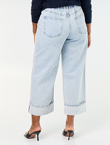 Jeans a gamba larga con risvolto alla base