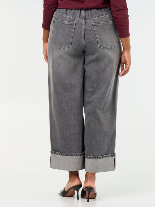 Jeans a gamba larga con risvolto alla base - Kiabi Jeans a gamba larga con risvolto alla base - Kiabi