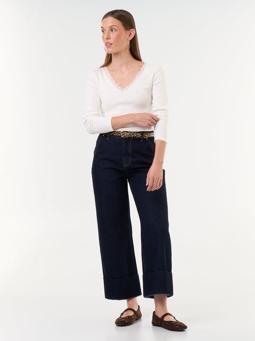 Jeans a tinta unita con ampi risvolti sul fondo - Kiabi