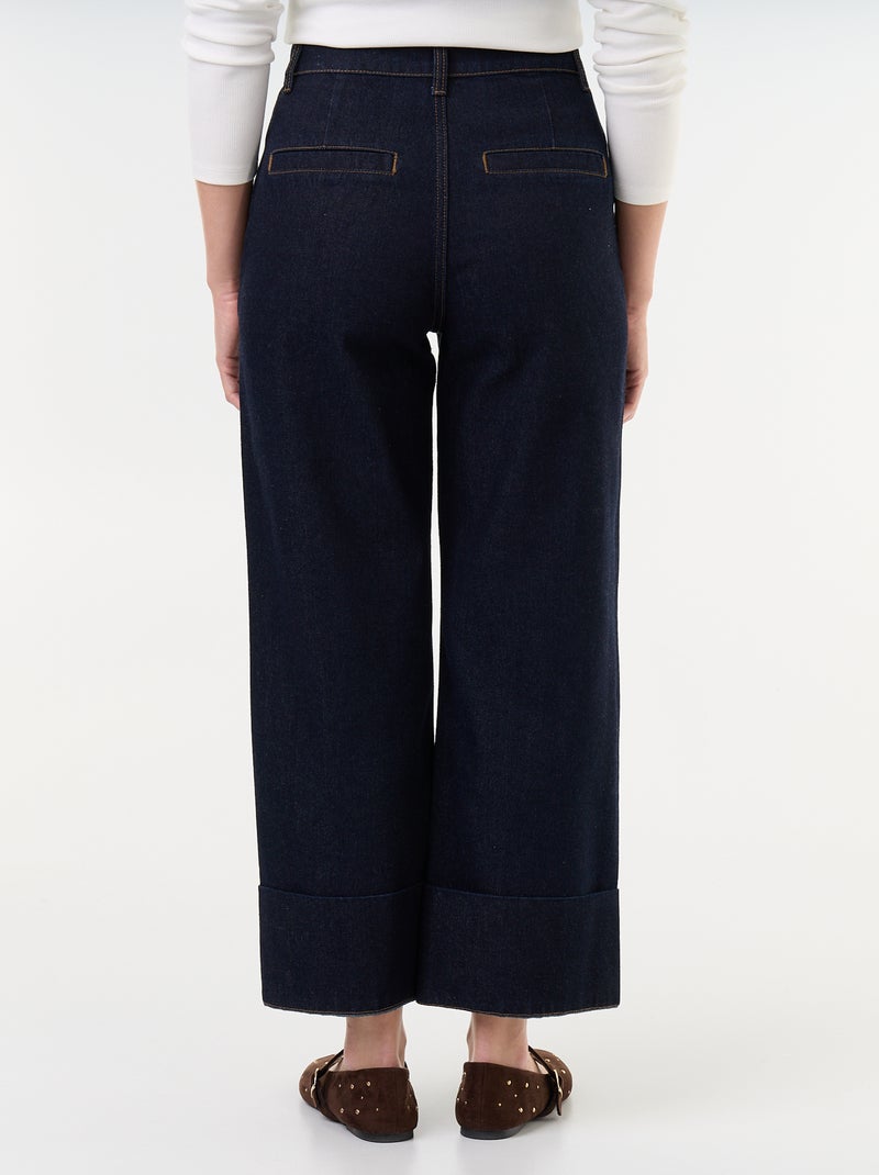 Jeans a tinta unita con ampi risvolti sul fondo Blu - Kiabi