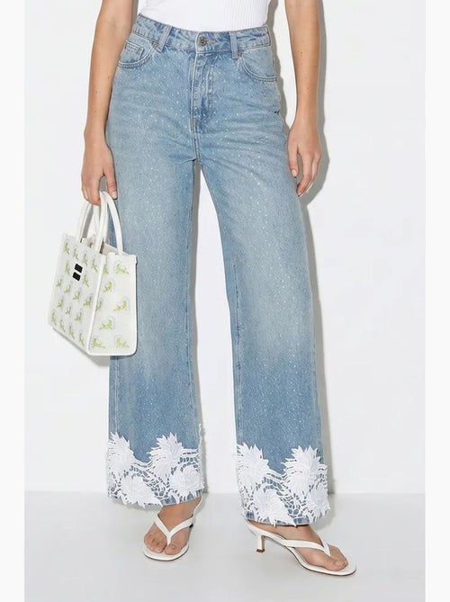 Jeans a vita alta a gamba larga ricamati lucci - Kiabi Jeans a vita alta a gamba larga ricamati lucci - Kiabi