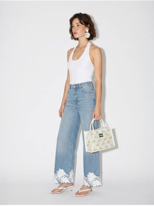 Jeans a vita alta a gamba larga ricamati lucci - Kiabi Jeans a vita alta a gamba larga ricamati lucci - Kiabi