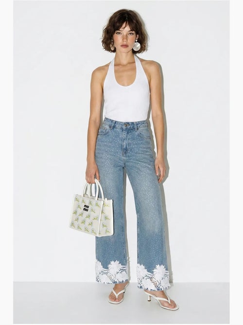 Jeans a vita alta a gamba larga ricamati lucci - Kiabi Jeans a vita alta a gamba larga ricamati lucci - Kiabi