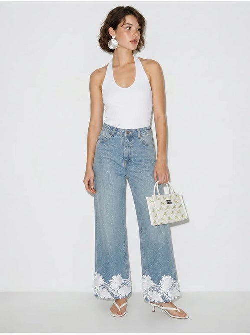 Jeans a vita alta a gamba larga ricamati lucci - Kiabi Jeans a vita alta a gamba larga ricamati lucci - Kiabi