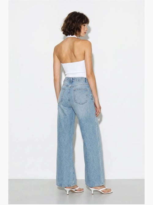 Jeans a vita alta a gamba larga ricamati lucci - Kiabi Jeans a vita alta a gamba larga ricamati lucci - Kiabi