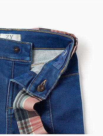 Jeans a zampa con tasche e cintura a quadri
