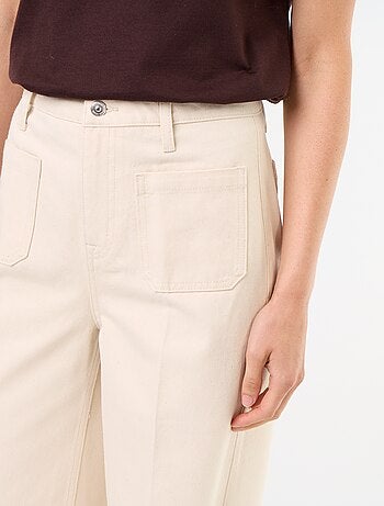 Jeans larghi a vita alta con tasche applicate