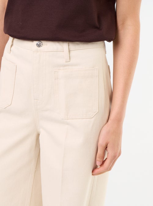 Jeans ampi a vita alta con tasche applicate - Kiabi Jeans ampi a vita alta con tasche applicate - Kiabi