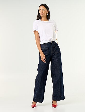 Jeans larghi a vita alta con tasche applicate